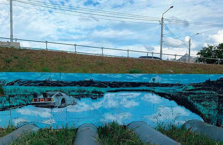 Назад в будущее: на Лыбедской магистрали снова появился олдскульный стрит-арт